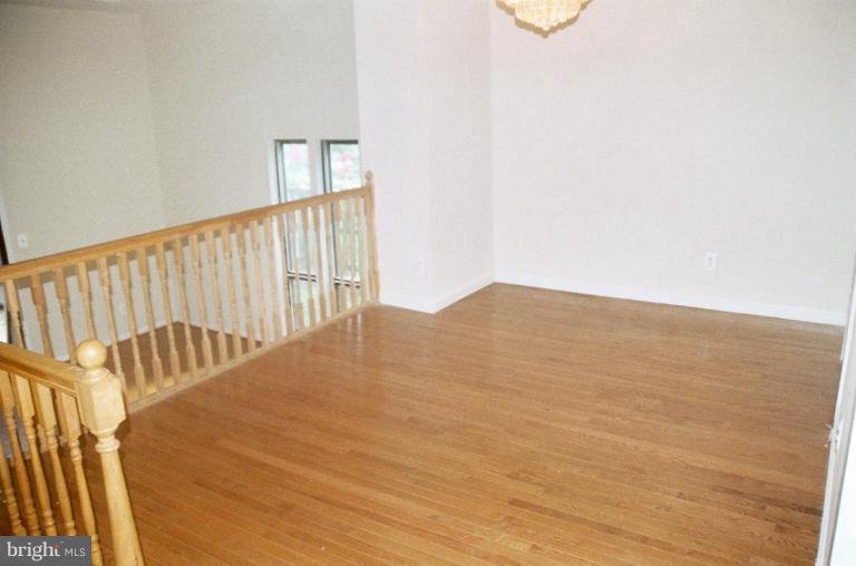 6351 Rockshire Street Alexandria, VA 22315 - Photo 6 of 11 New hardwoods & new paint.