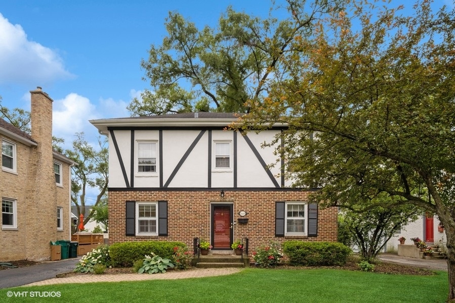 front view of a house with a yard