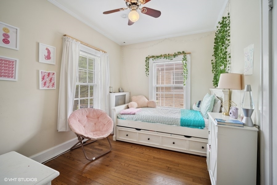 2129 Illinois Road Northbrook, IL 60062 - Photo 11 of 20 a bedroom with furniture and a window