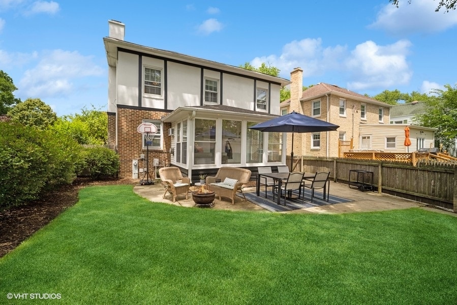 2129 Illinois Road Northbrook, IL 60062 - Photo 14 of 20 a view of a house with a yard and sitting area