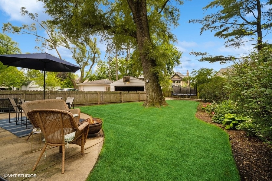 2129 Illinois Road Northbrook, IL 60062 - Photo 15 of 20 a view of yard with outdoor seating and green space