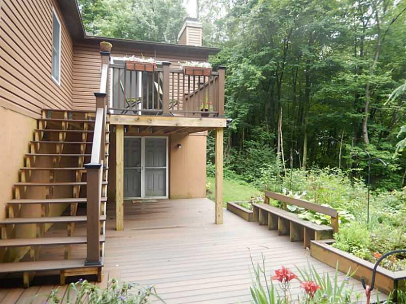 405 Marguerite Road Latrobe, PA 15650 - Photo 22 of 24 Patio/Deck. Lower level covered deck and open area for enjoy the shade or sun