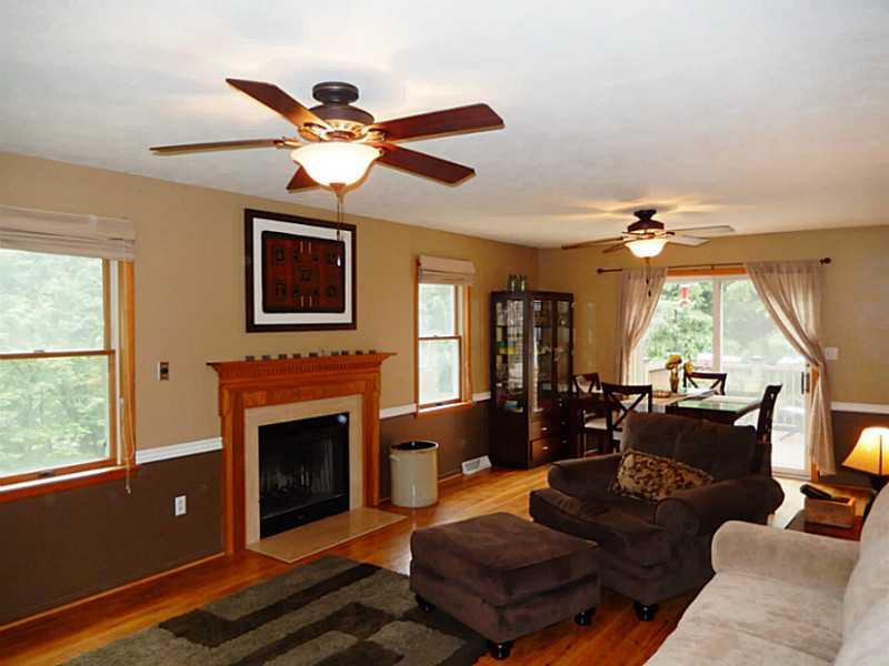 405 Marguerite Road Latrobe, PA 15650 - Photo 9 of 24 Family Room. Family room has a walk out to private deck overlooking your private 2.1 acres