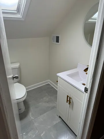 a bathroom with a sink and a toilet