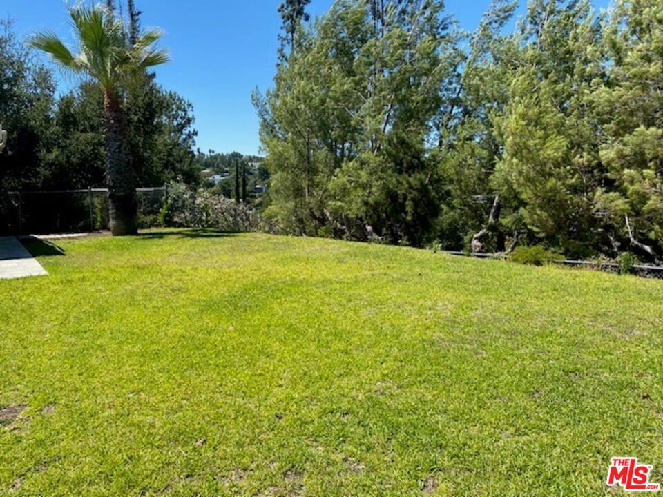 4014 Rogen Drive Encino, CA 91436 - Photo 11 of 22 a view of field with trees in the background