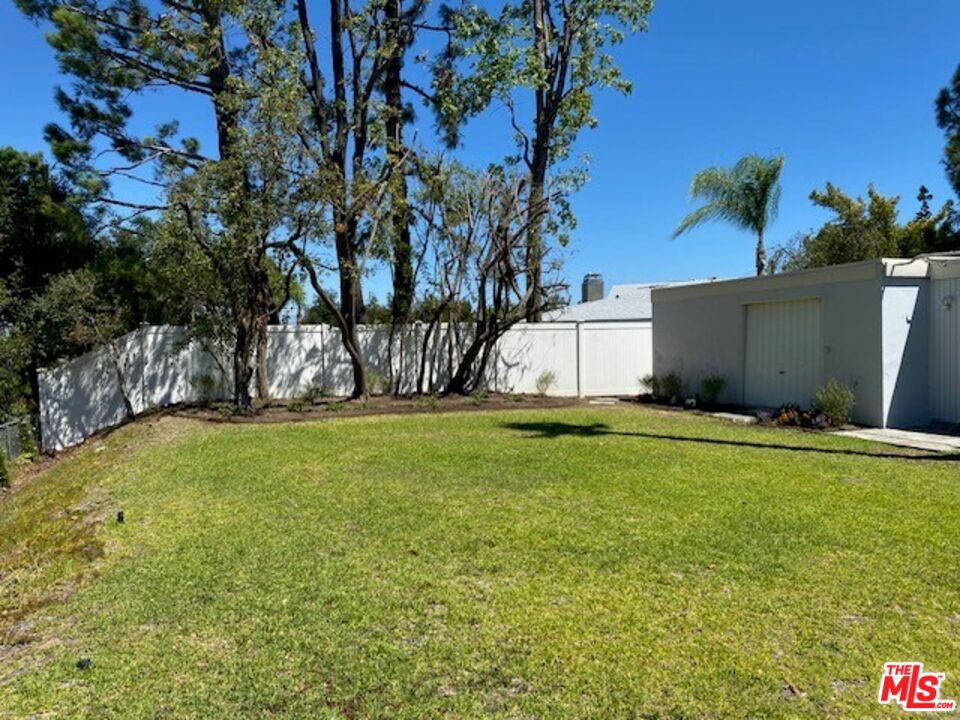4014 Rogen Drive Encino, CA 91436 - Photo 9 of 22 a view of a backyard