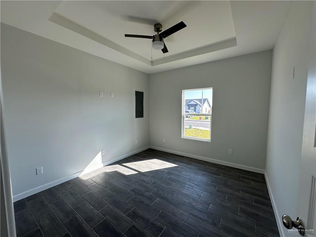 1703 Unity Drive Mercedes, TX 78570 - Photo 5 of 10 a view of an empty room and window