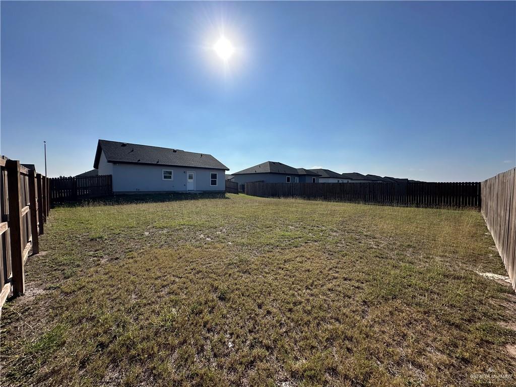 1703 Unity Drive Mercedes, TX 78570 - Photo 10 of 10 a view of a large body of water with a building in the background