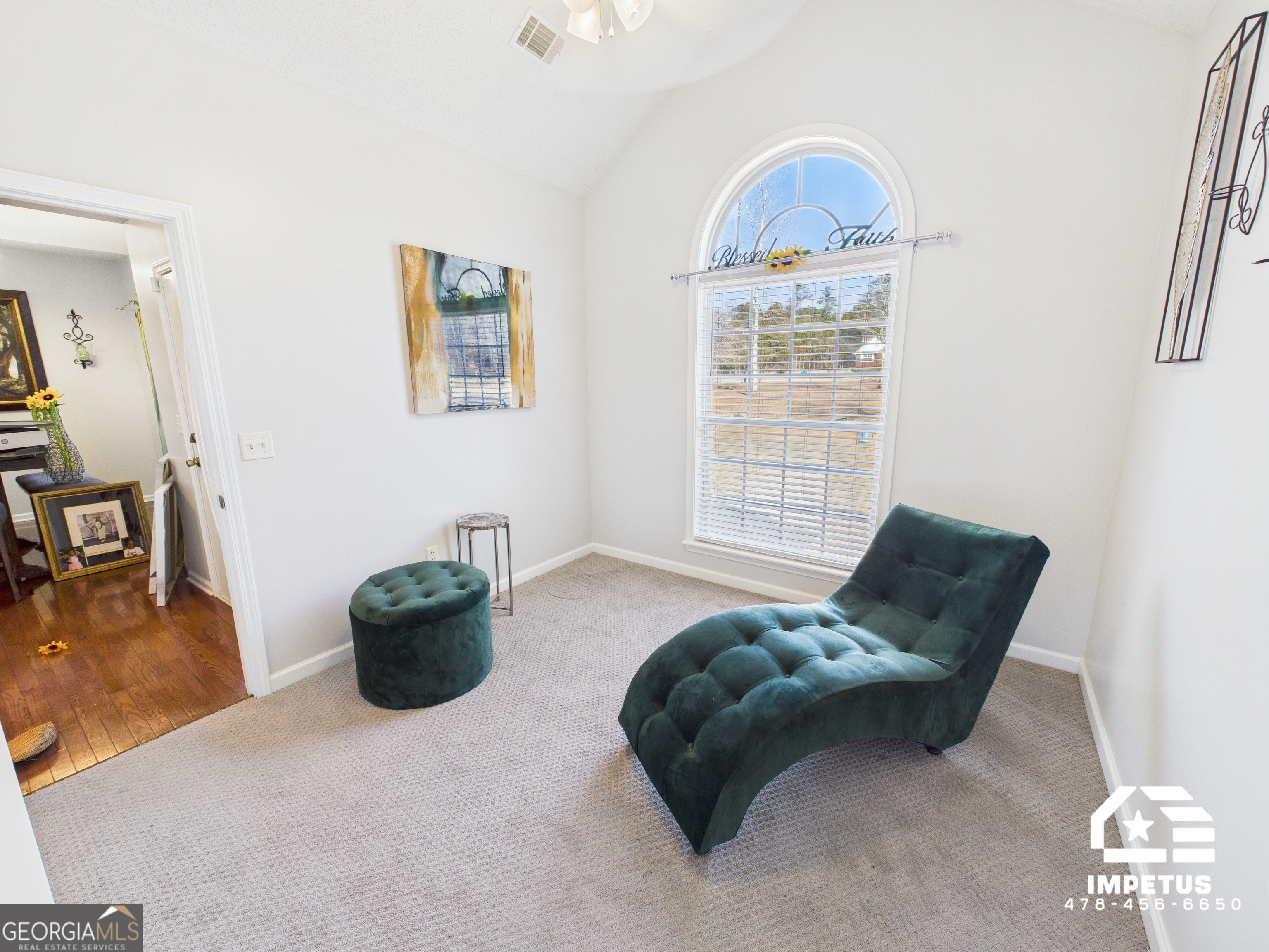 100 Crystal Ridge Road Northwest Milledgeville, GA 31061 - Photo 49 of 53 a living room with furniture and a window