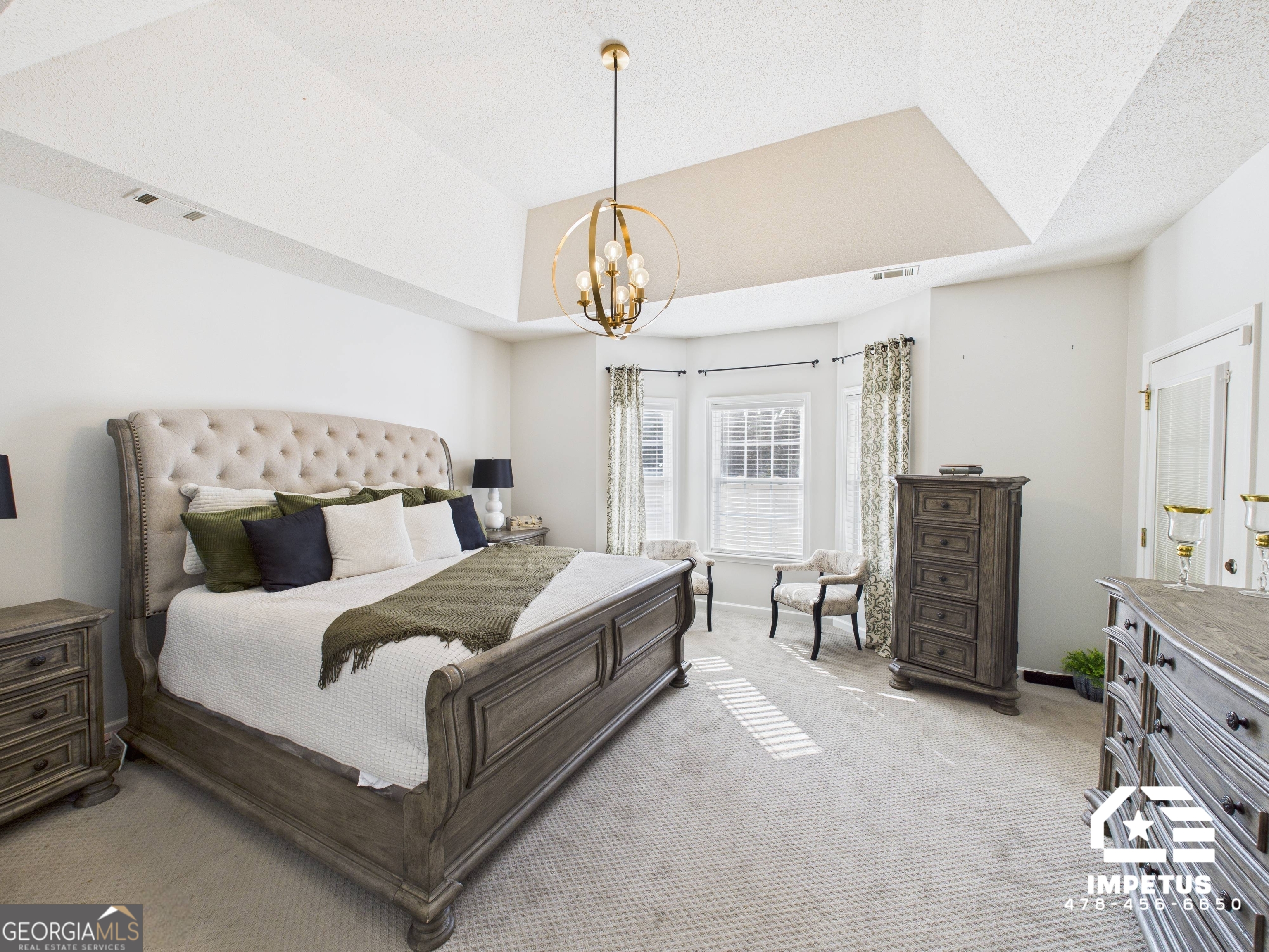 100 Crystal Ridge Road Northwest Milledgeville, GA 31061 - Photo 5 of 53 a bedroom with bed and window