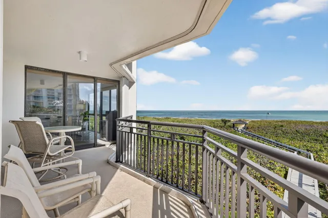 a view of balcony with furniture