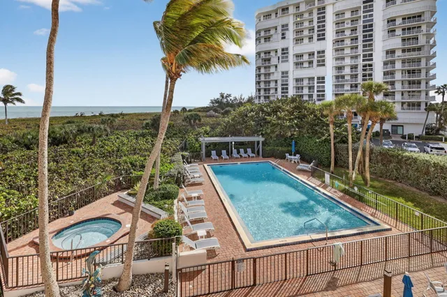 a living room with a couch and a large window
