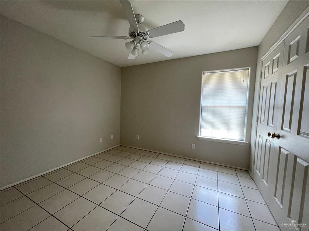 2311 Dora Jeanne, Unit A Mission, TX 78574 - Photo 5 of 9 an empty room with windows