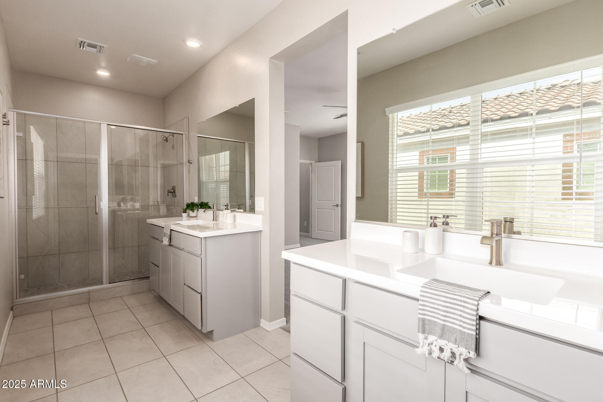 1535 East Dublin Street Gilbert, AZ 85295 - Photo 15 of 31 a bathroom with a sink shower and a mirror