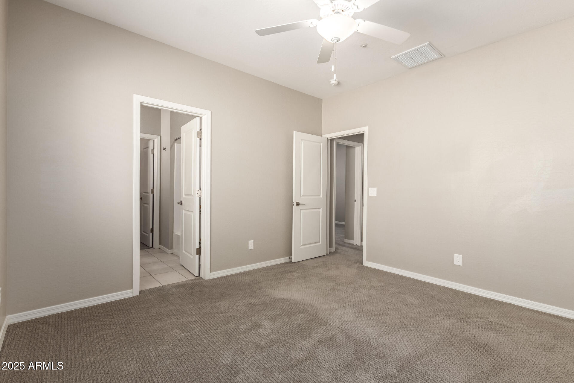 1535 East Dublin Street Gilbert, AZ 85295 - Photo 19 of 31 an empty room with a fan & a ceiling fan