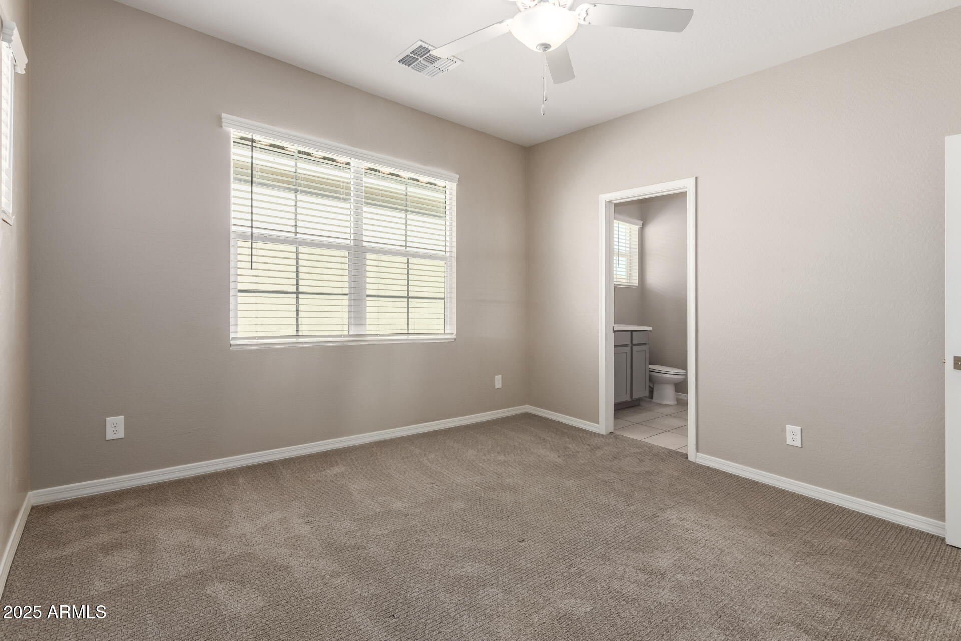 1535 East Dublin Street Gilbert, AZ 85295 - Photo 20 of 31 an empty room with a window
