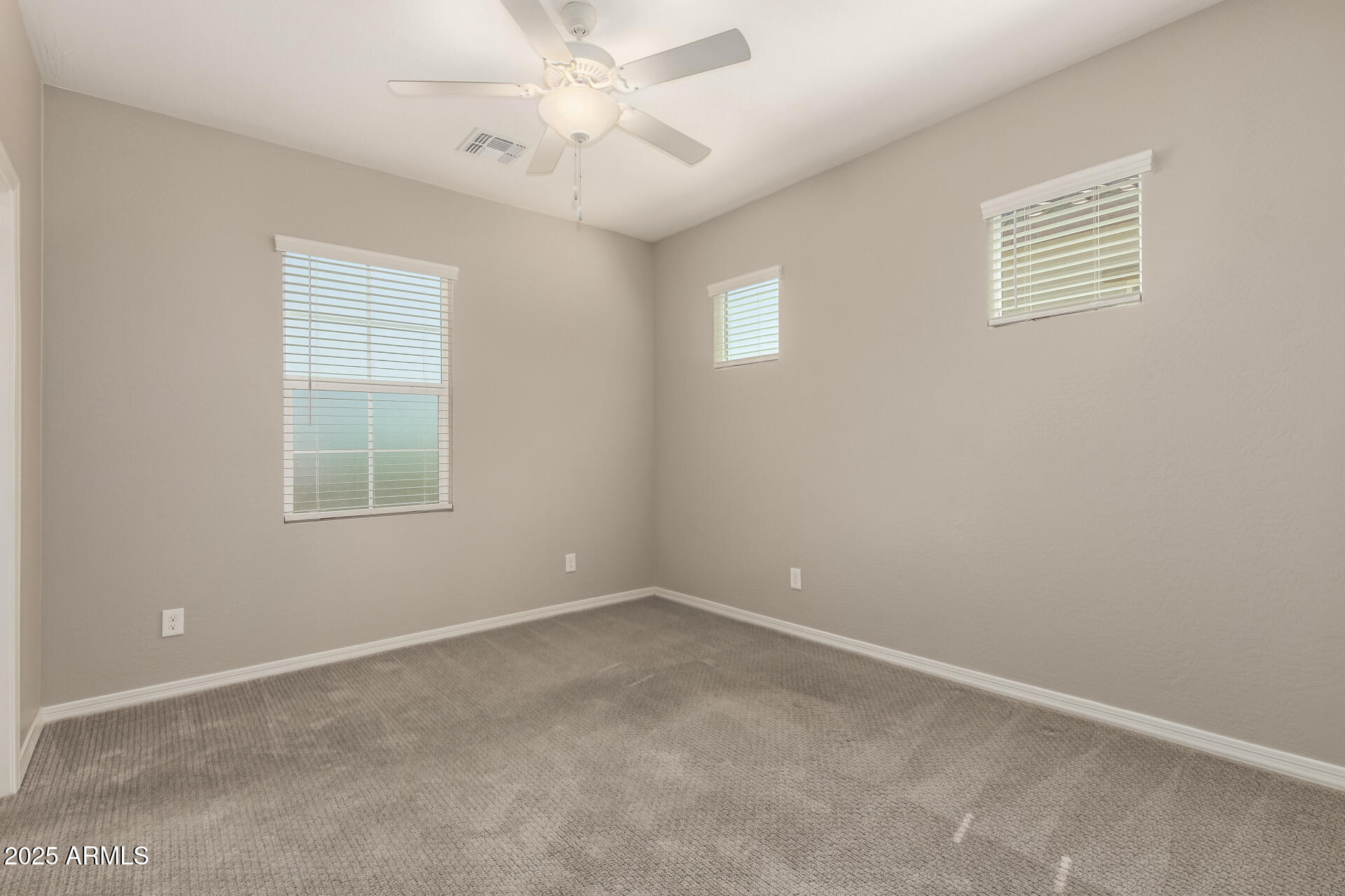 1535 East Dublin Street Gilbert, AZ 85295 - Photo 22 of 31 an empty room with a window