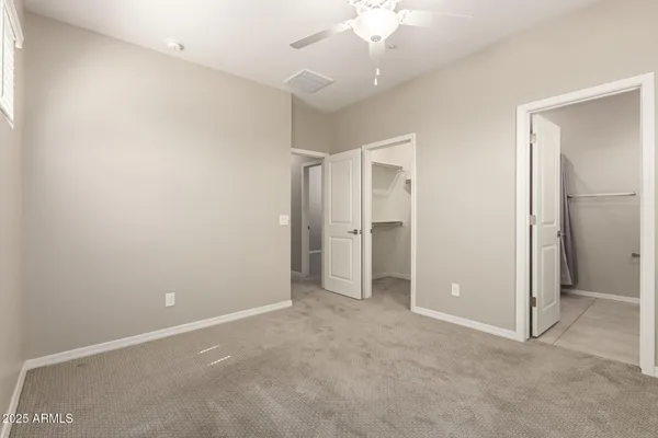 an empty room with a bathroom