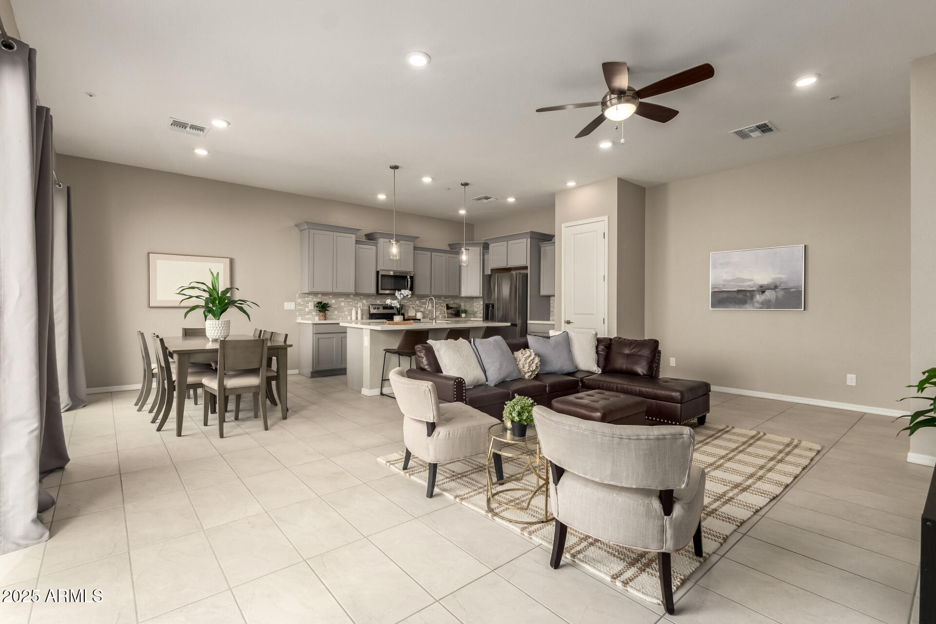 1535 East Dublin Street Gilbert, AZ 85295 - Photo 5 of 31 a living room with furniture and kitchen view