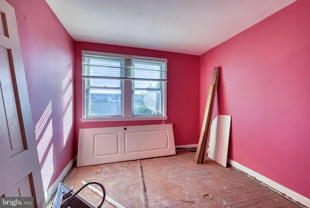 a view of a room with a large window
