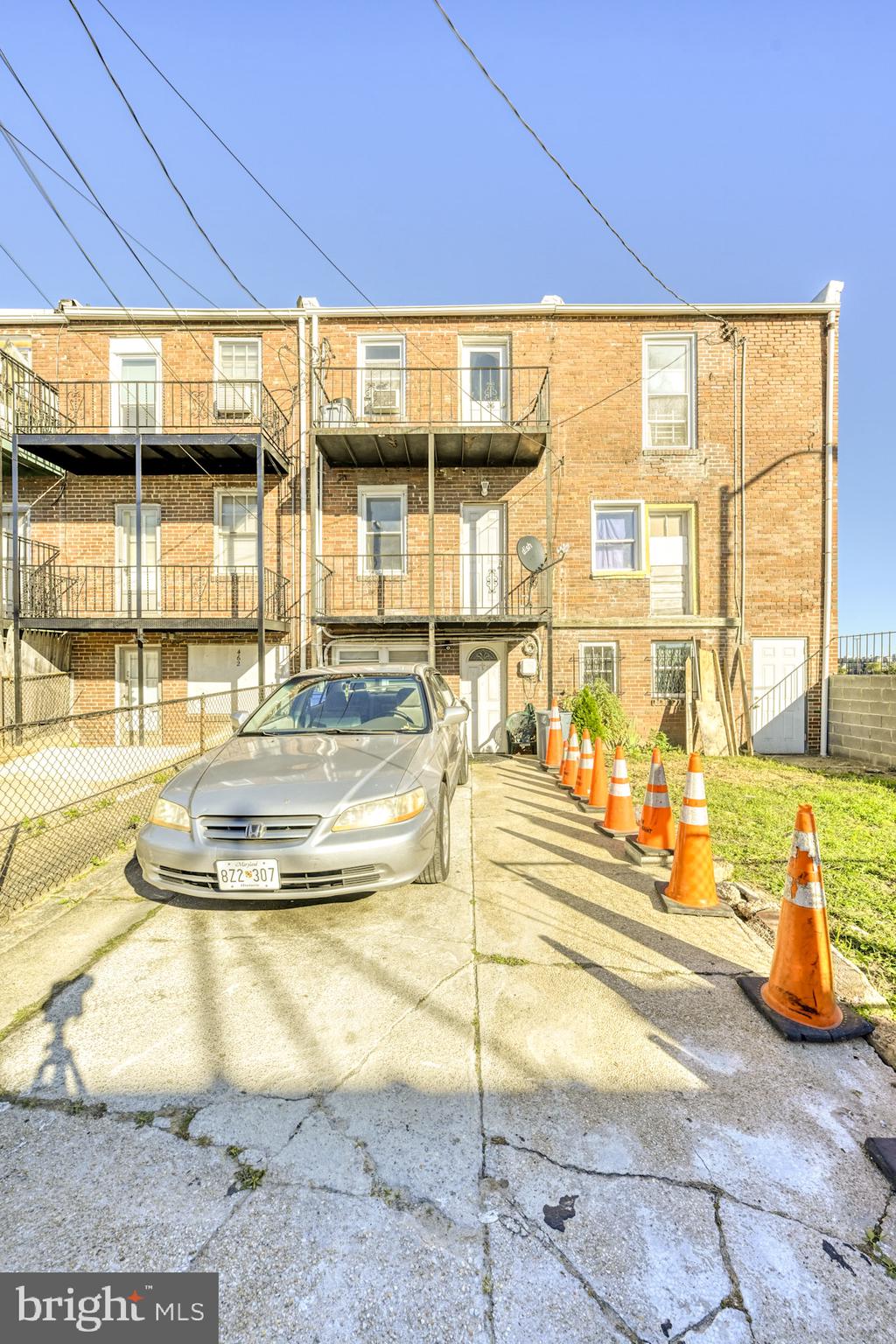 466 Hornel Street Baltimore, MD 21224 - Photo 17 of 19 a view of a swimming pool with outdoor seating