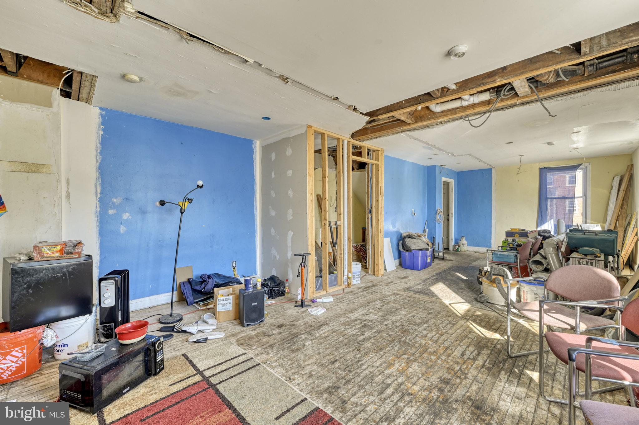 466 Hornel Street Baltimore, MD 21224 - Photo 3 of 19 a view of a livingroom with workspace and a window