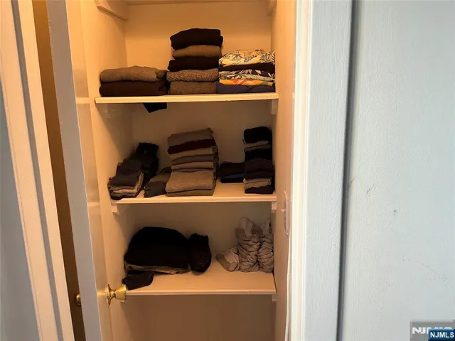 a close view of sink and cabinets