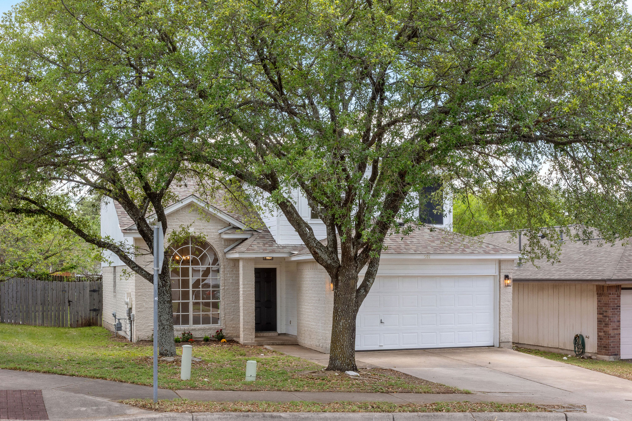 501 Shep Street Austin, TX 78748 - Photo 2 of 40 a front view of a house with a yard
