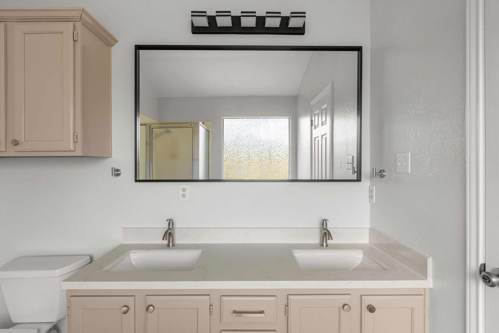 501 Shep Street Austin, TX 78748 - Photo 26 of 40 a bathroom with a sink and a toilet