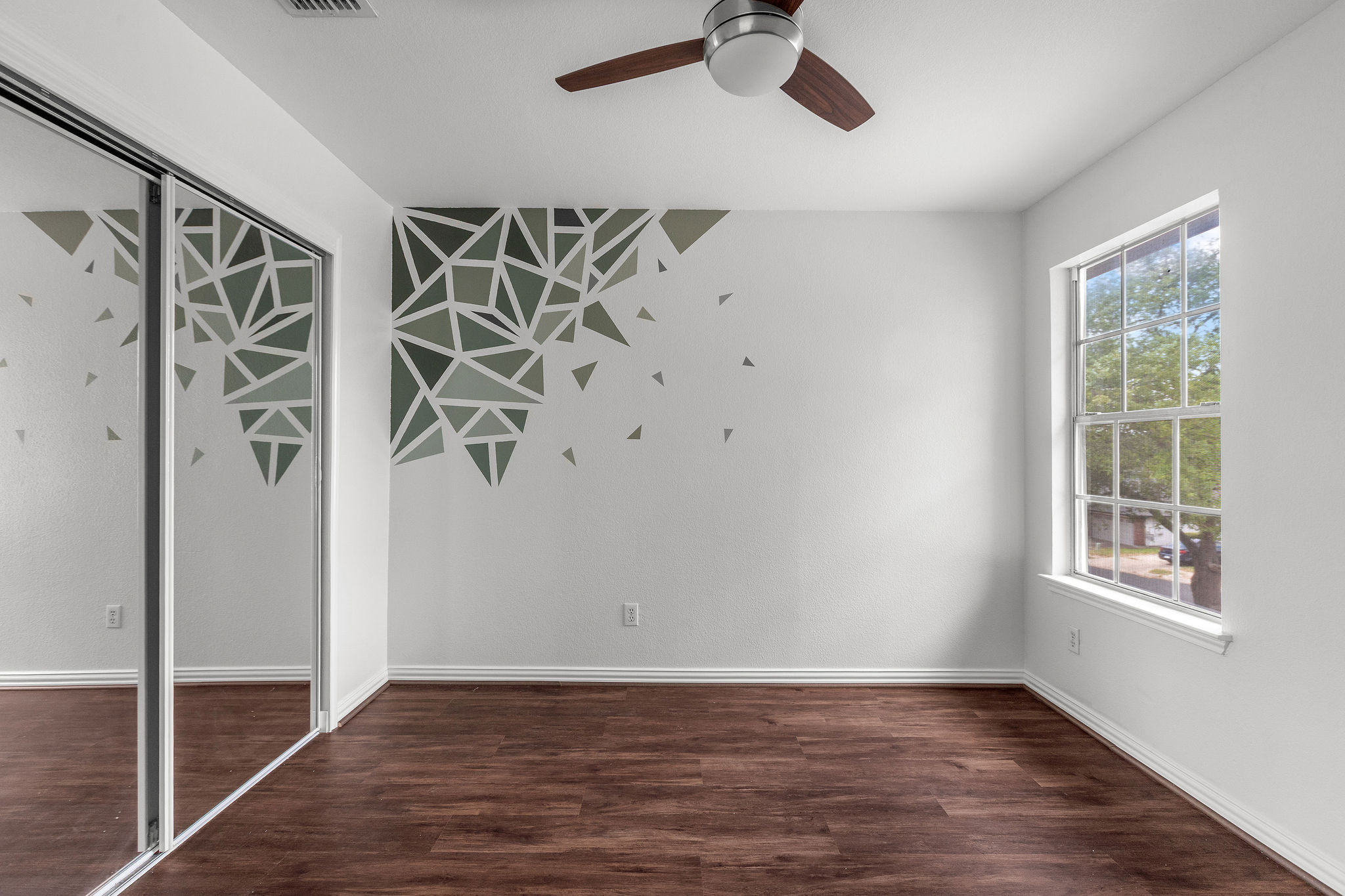 501 Shep Street Austin, TX 78748 - Photo 29 of 40 wooden floor in an empty room with a window