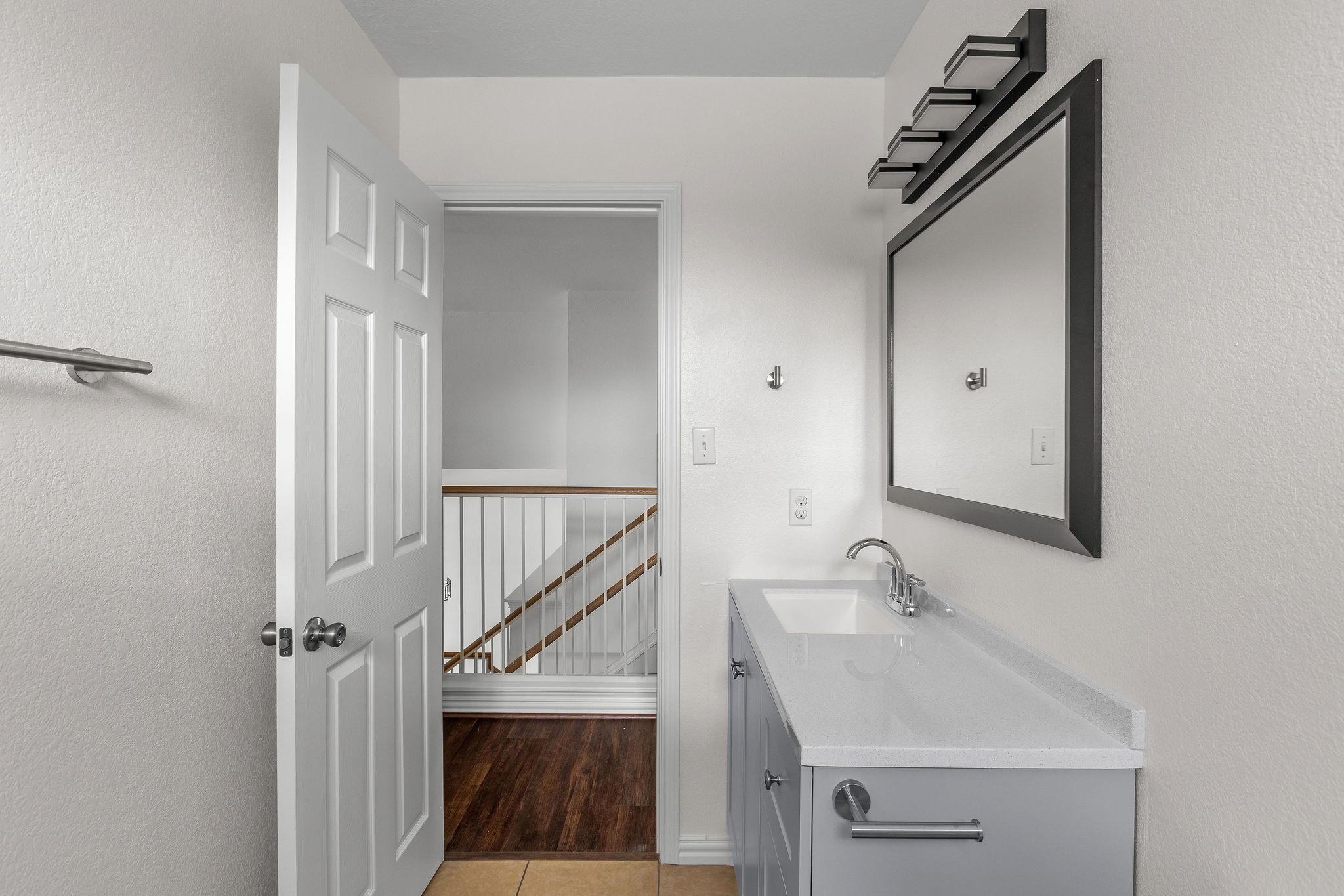 501 Shep Street Austin, TX 78748 - Photo 33 of 40 a bathroom with a sink a mirror and a shower