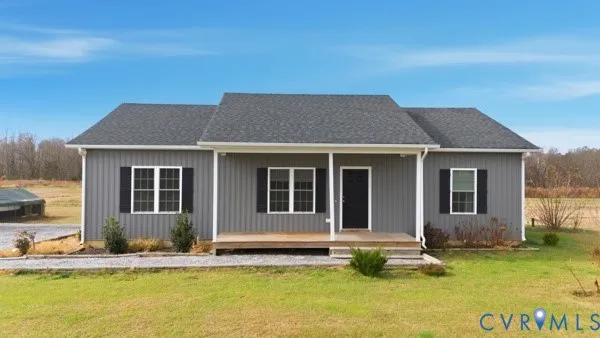 a house with swimming pool in front of it