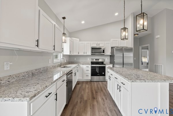 1251 Poorhouse Road Green Bay, VA 23942 - Photo 17 of 40 a kitchen with stainless steel appliances granite countertop a sink stove and refrigerator