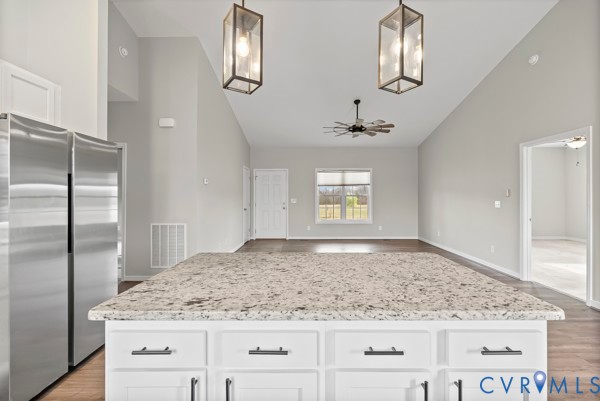 1251 Poorhouse Road Green Bay, VA 23942 - Photo 20 of 40 a view of a kitchen counter space and chandelier