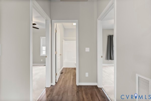 1251 Poorhouse Road Green Bay, VA 23942 - Photo 28 of 40 a view of a hallway with wooden floor
