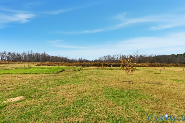 1251 Poorhouse Road Green Bay, VA 23942 - Photo 36 of 40 a view of a lake with houses in background