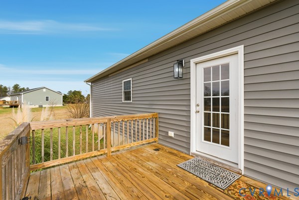 1251 Poorhouse Road Green Bay, VA 23942 - Photo 7 of 40 a view of a balcony with wooden floor