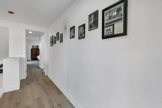 a bathroom with a double vanity sink mirror and shower