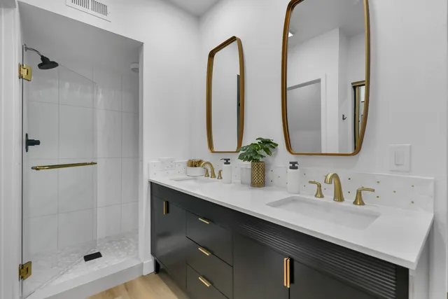 a bedroom with a bed and a chair