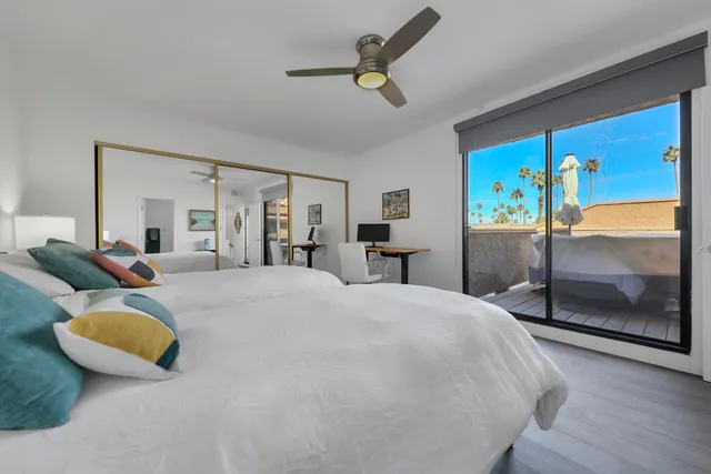 a roof deck with a table and chairs