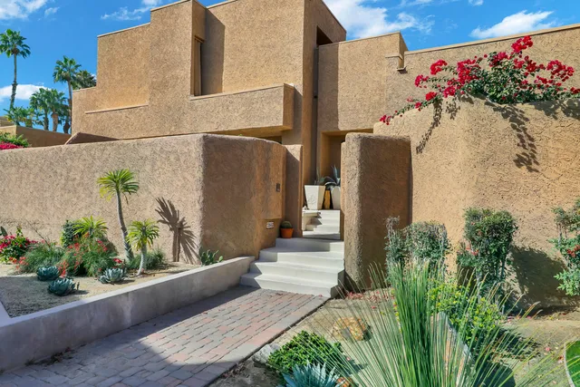 a view of swimming pool with chairs