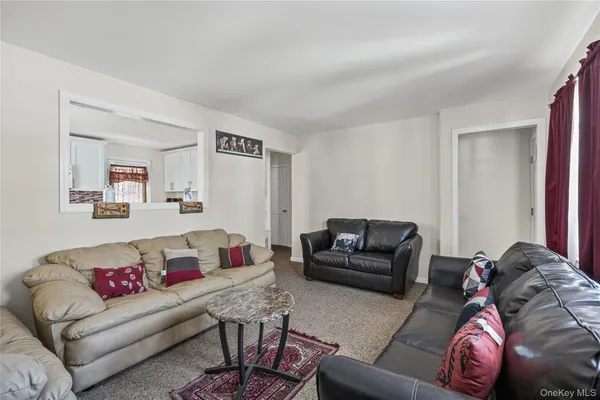 a living room with furniture and a couch