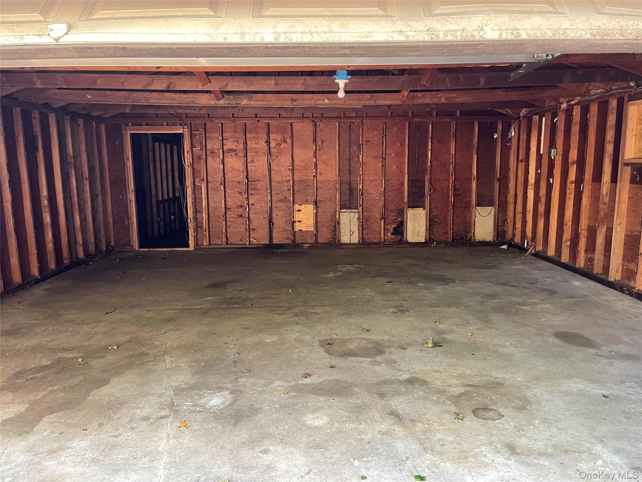 183 Mark Tree Road Centereach, NY 11720 - Photo 10 of 10 a view of a room with a wooden door