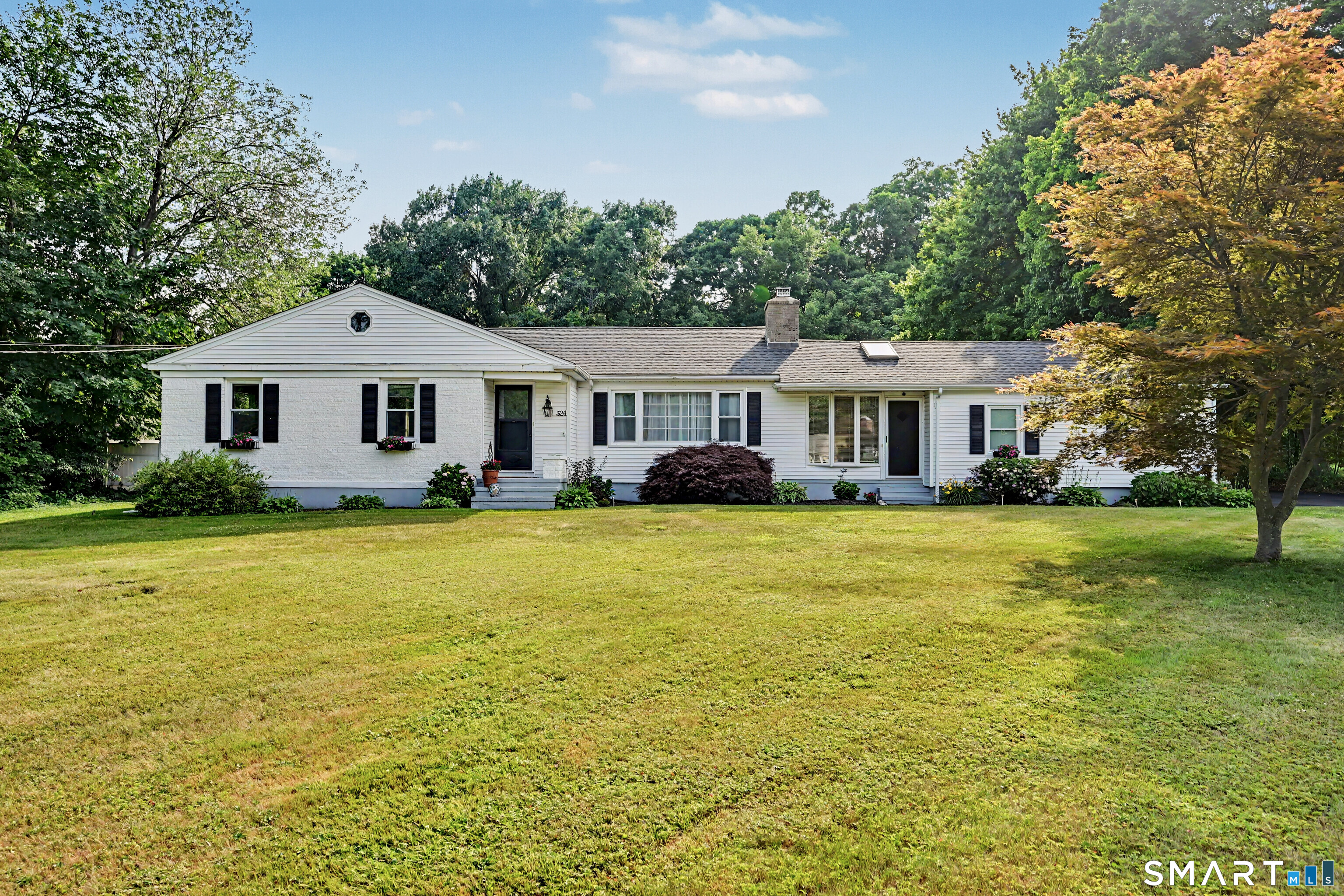 524 Ferry Road Orange, CT 06477 - Photo 1 of 40 a front view of a house with swimming pool