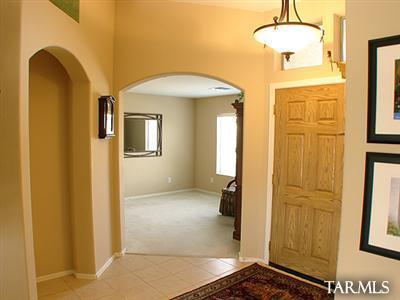 62195 East Northwood Road Tucson, AZ 85739 - Photo 5 of 25 a view of a hallway with a front door