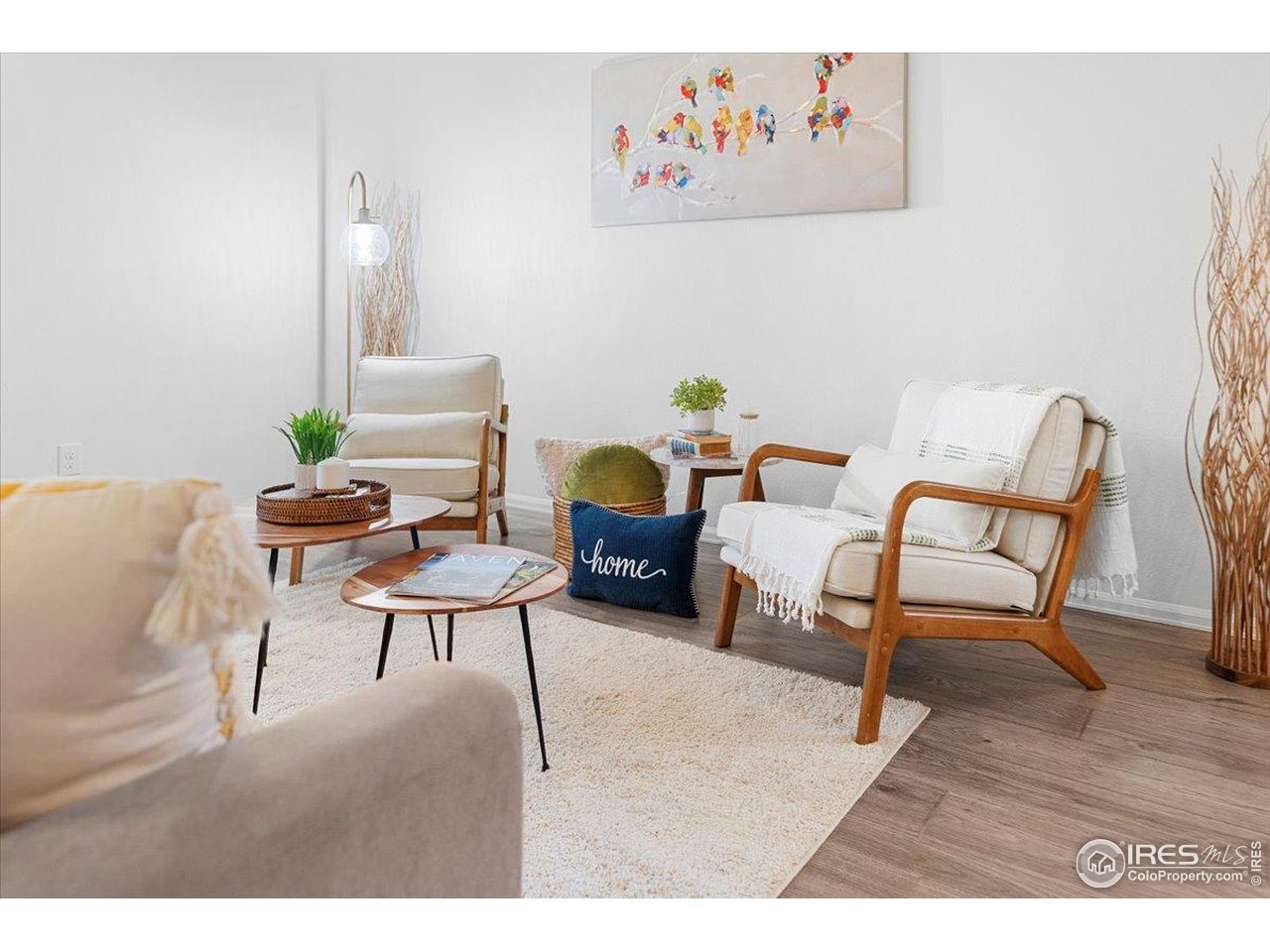 501 Buckrake Street Severance, CO 80550 - Photo 18 of 50 a living room with furniture and a wooden floor