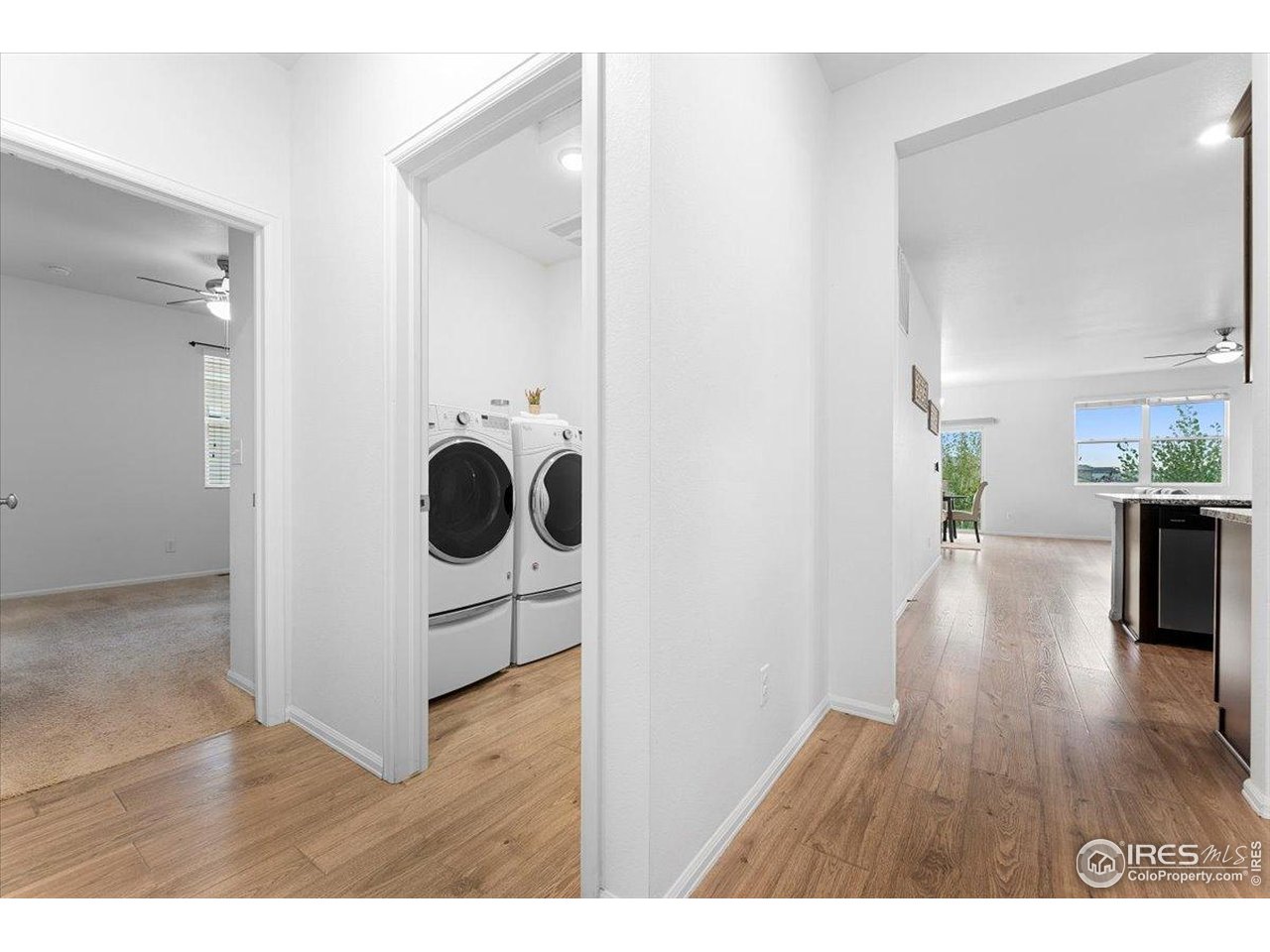 501 Buckrake Street Severance, CO 80550 - Photo 23 of 50 view of living room with wooden floor