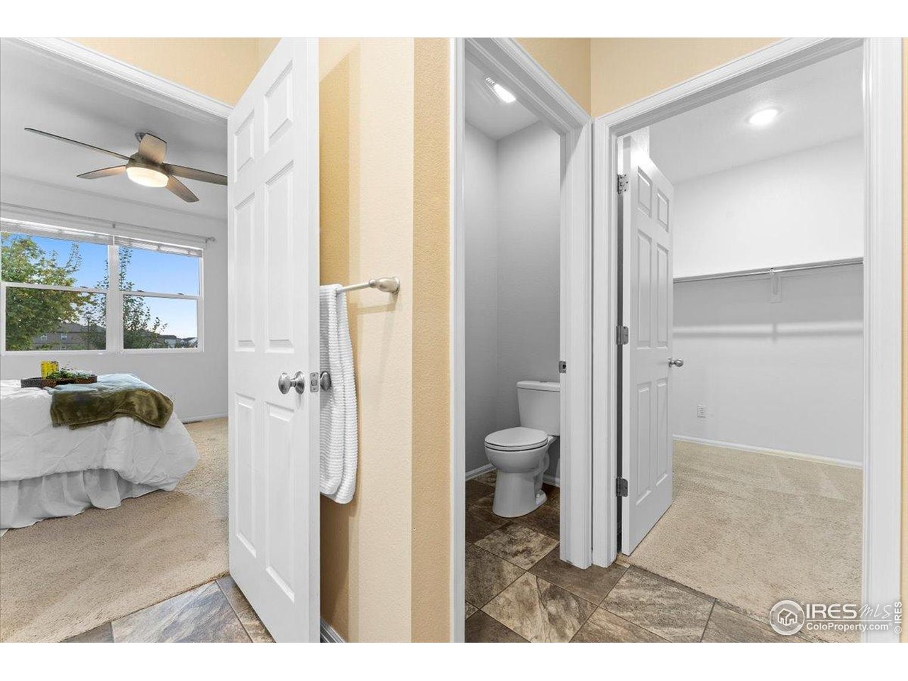 501 Buckrake Street Severance, CO 80550 - Photo 28 of 50 a bathroom with a sink and a glass door shower