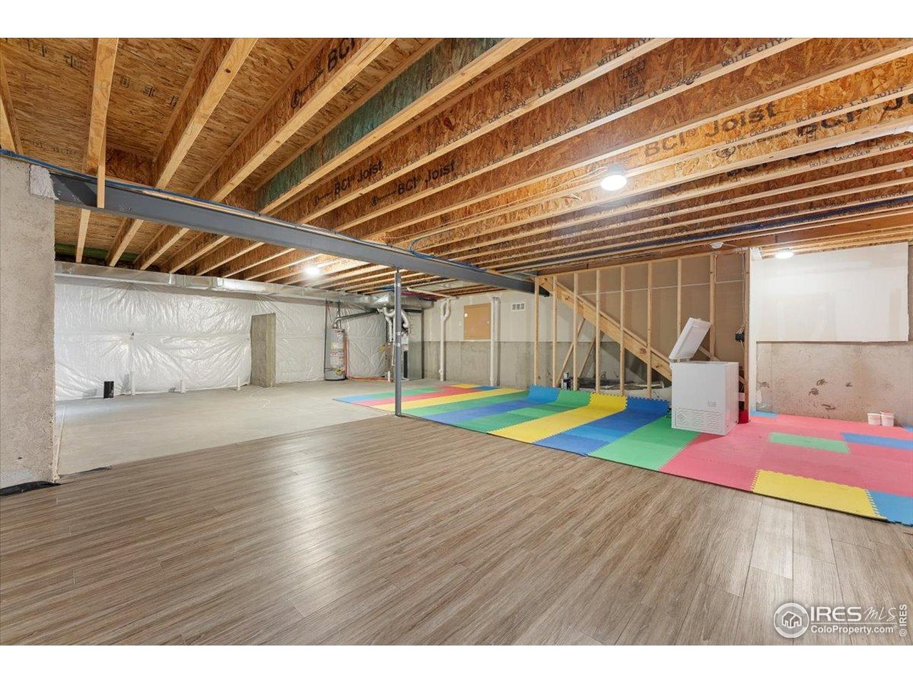 501 Buckrake Street Severance, CO 80550 - Photo 36 of 50 a room with pool table and windows