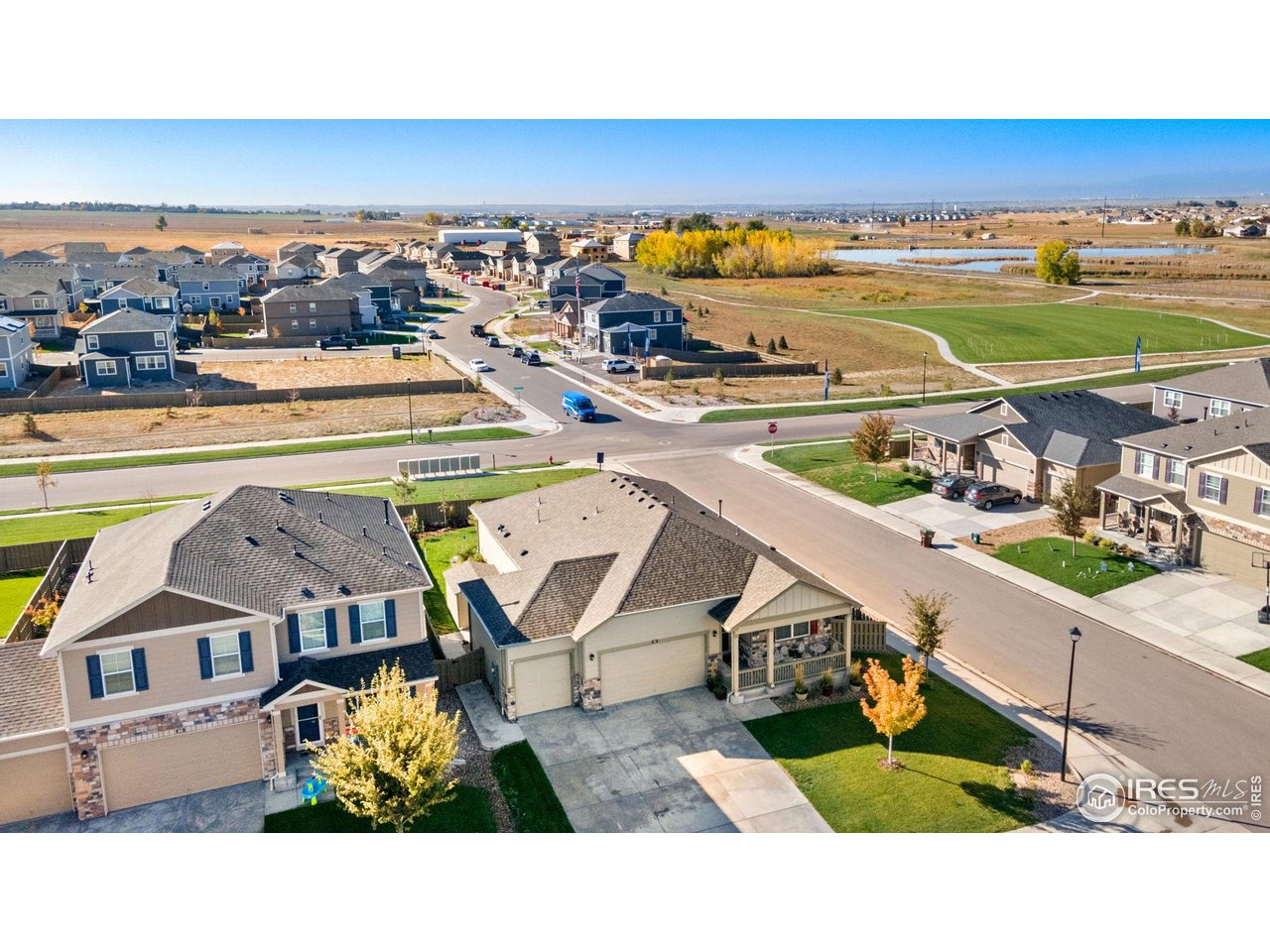 501 Buckrake Street Severance, CO 80550 - Photo 3 of 50 an aerial view of a house with a garden and mountain view